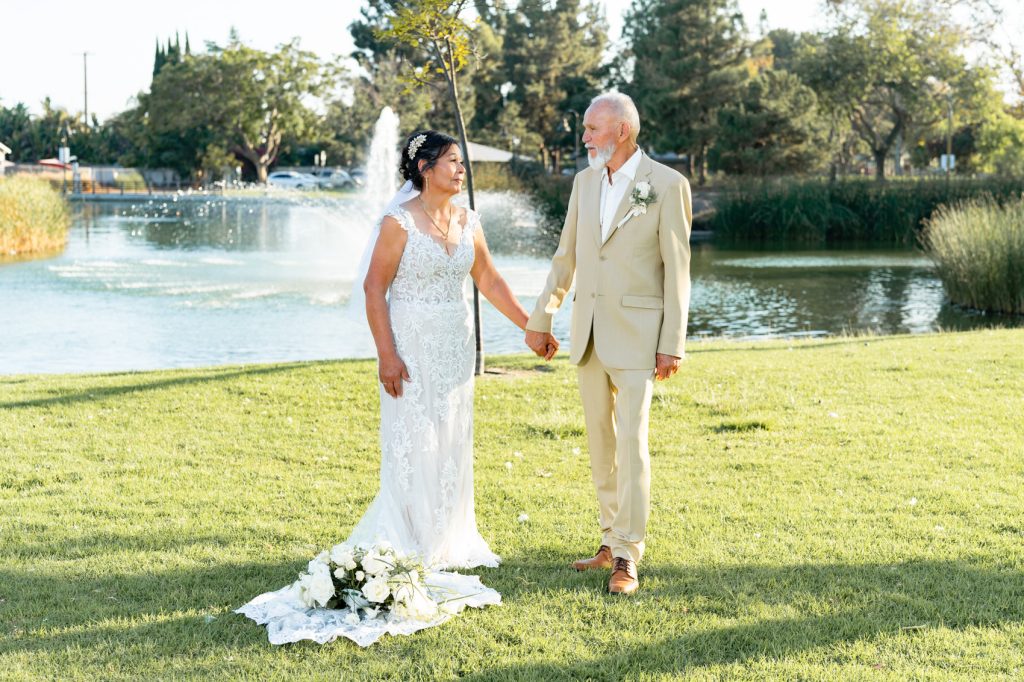 Couple walking past a fountain